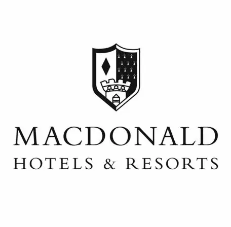 A black and white logo of macdonald hotels & resorts.